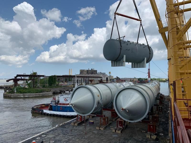 Oil and gas equipment being lifted